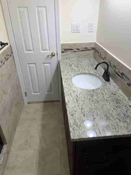 basement bathroom remodel with granite counter top